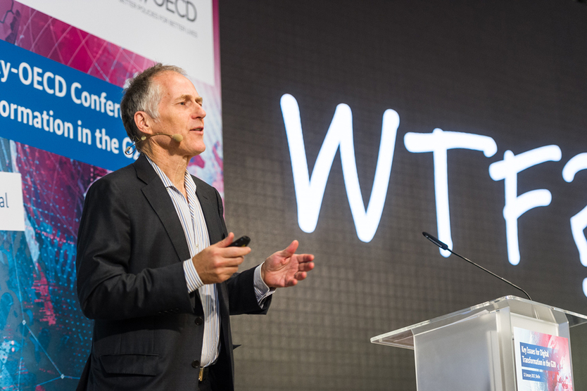 Tim O’Reilly, founder and CEO of O’Reilly Media Inc., gave a presentation outlining the benefits and the challenges linked to digitalisation; source: BMWi/Maurice Weiss